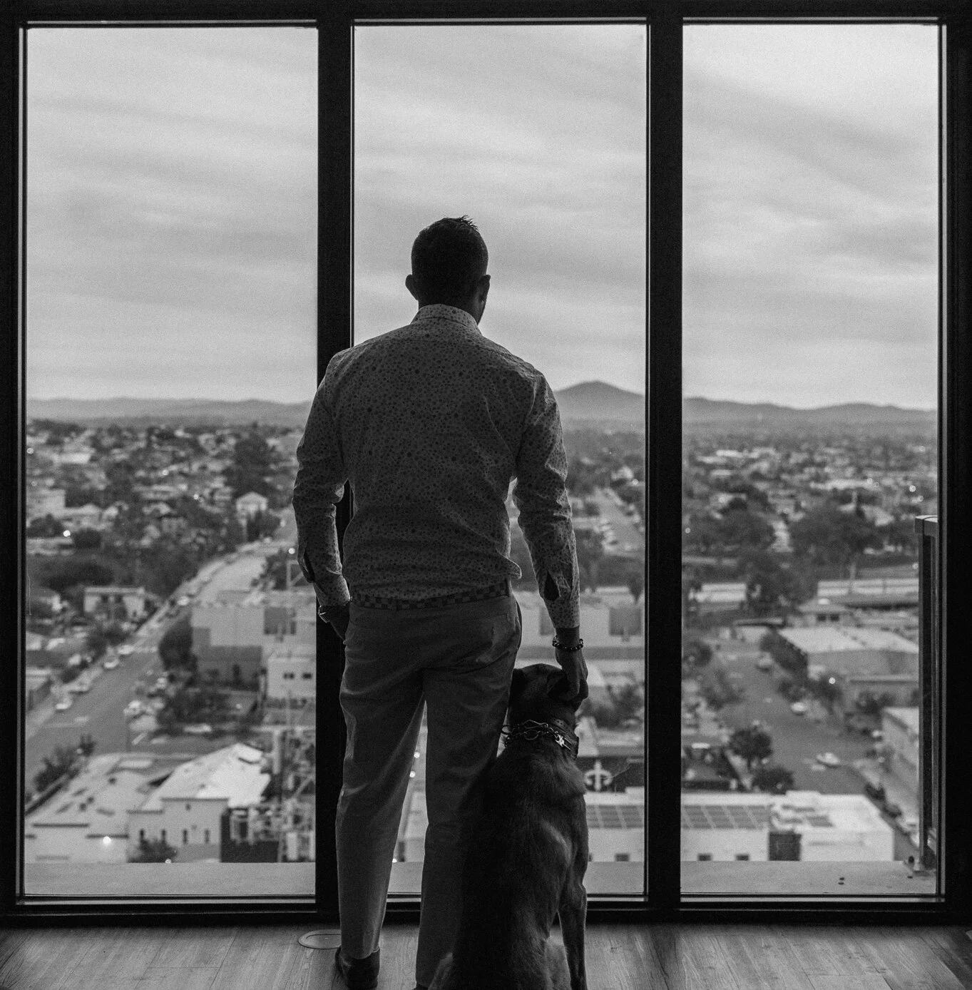 Ali Horuz looking out over downtown San Diego