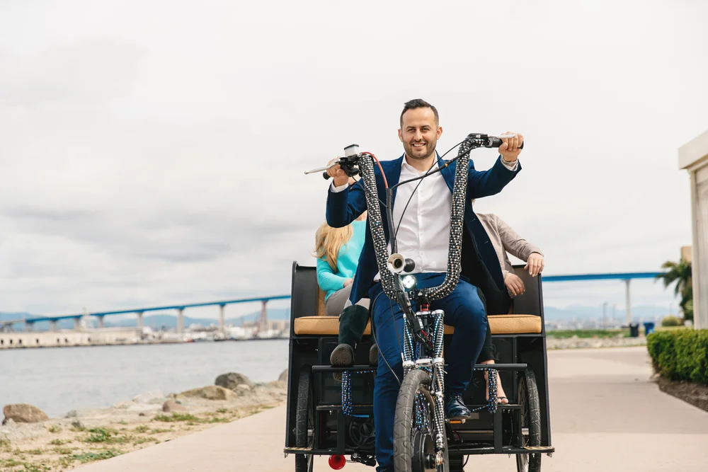 Ali Horuz with a VIP pedicab