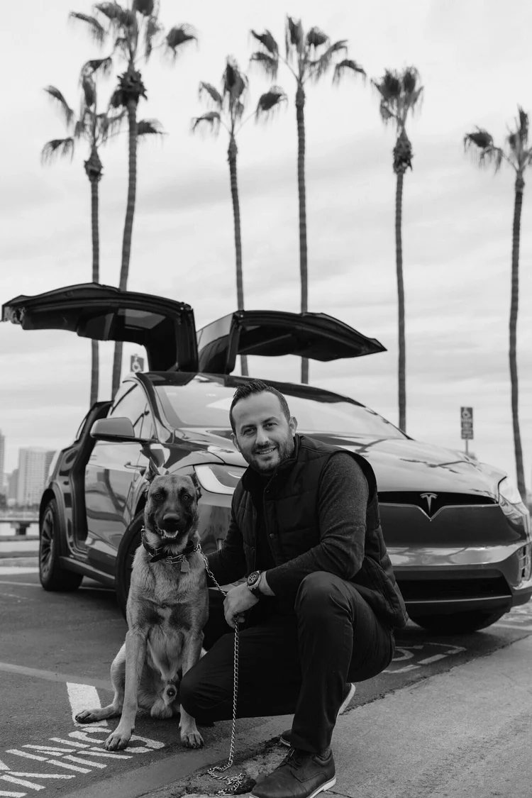 Ali Horuz with his dog in San Diego